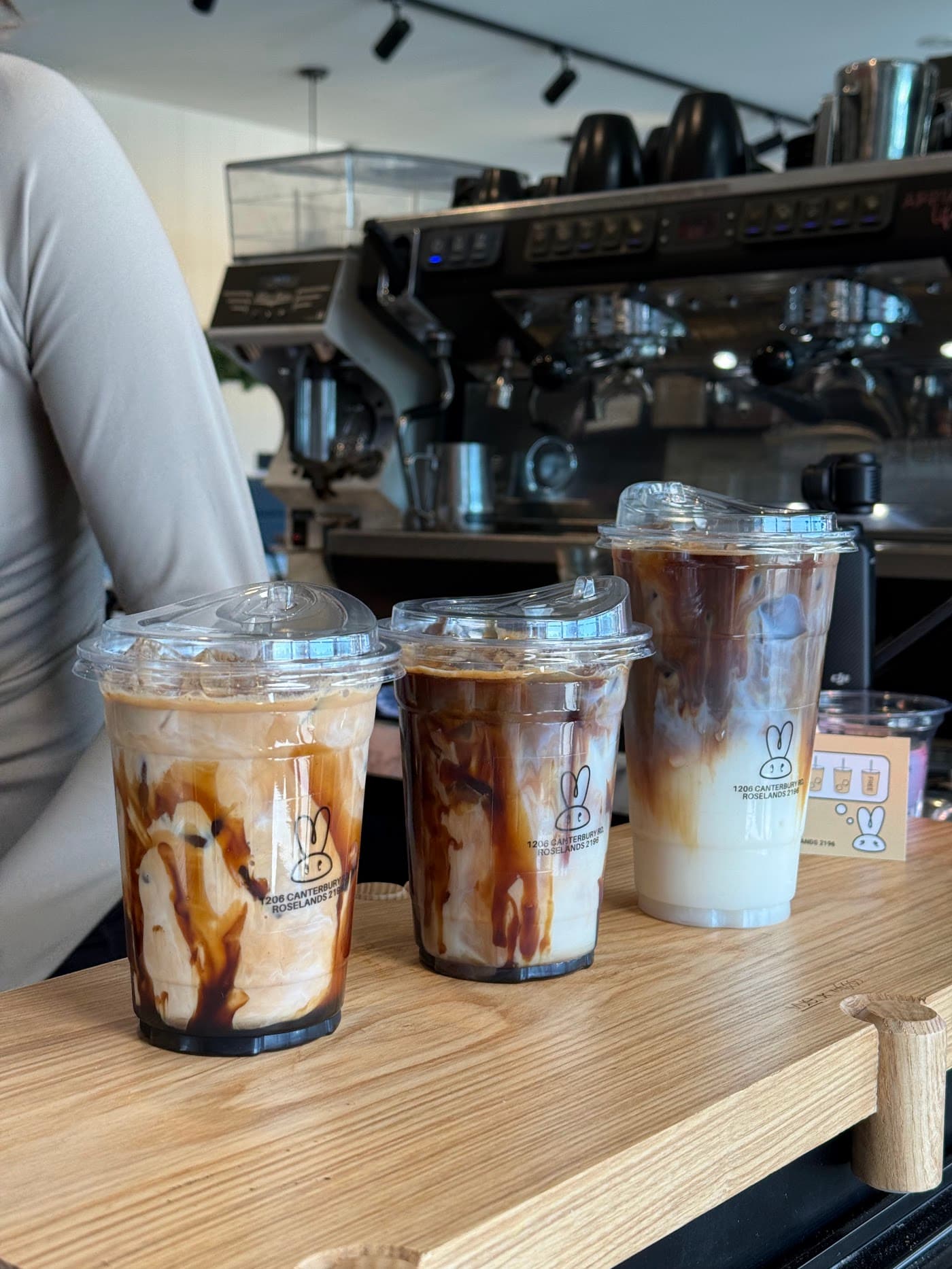 Three expertly crafted lattes and coffees at our Roselands cafe